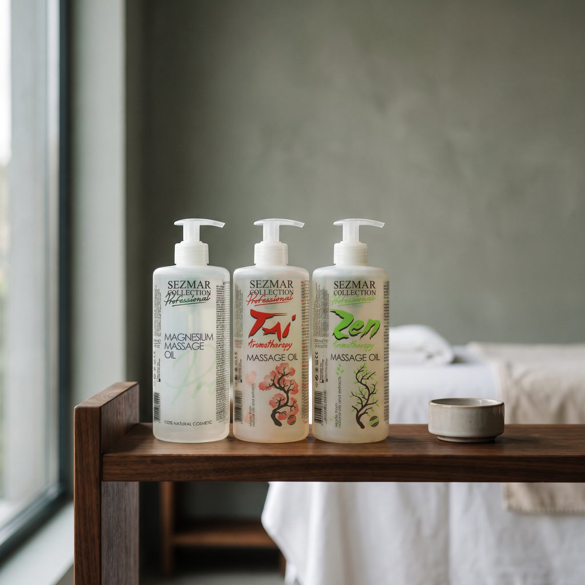 Magnesium, Tai and Zen massage oils 500 ml side by side on a treatment room shelf