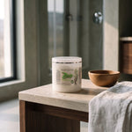 Zen Body Scrub 500 ml on a stone bench next to a wooden bowl